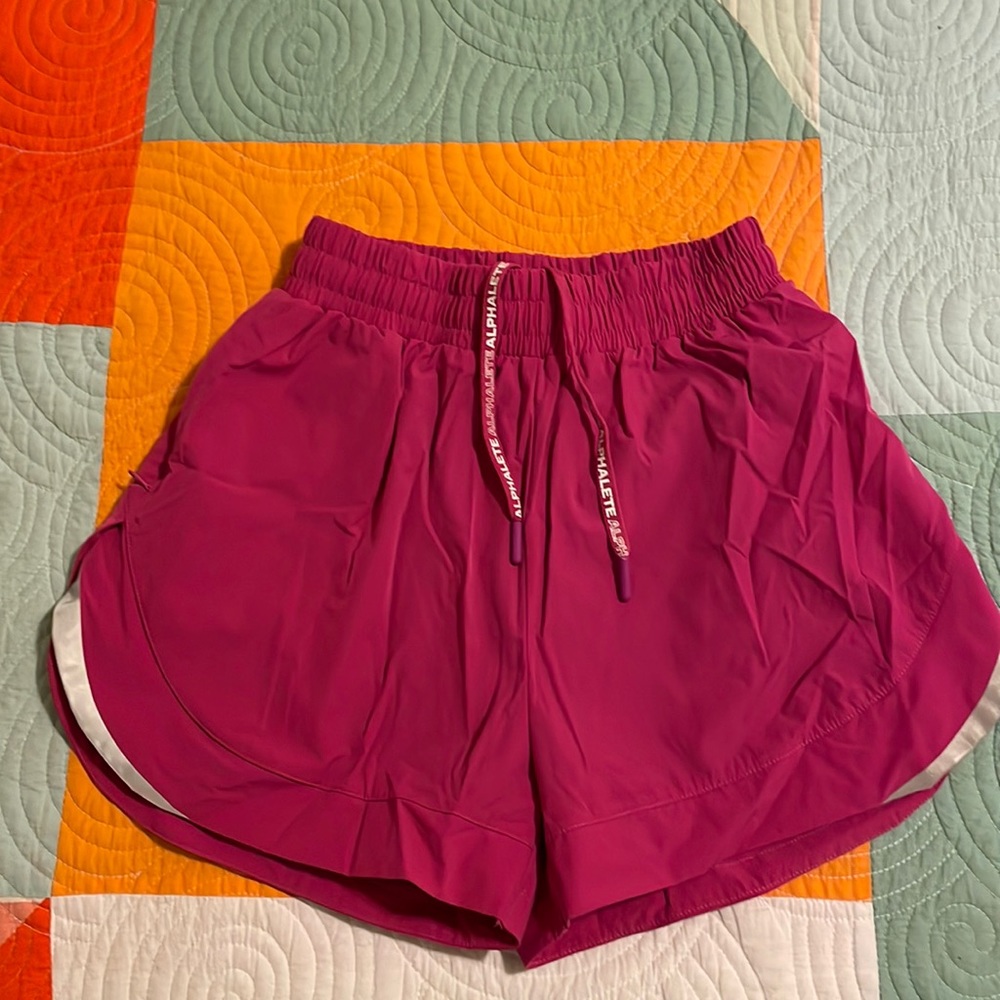 Alphalete 3” Stride Short in Arcade Pink